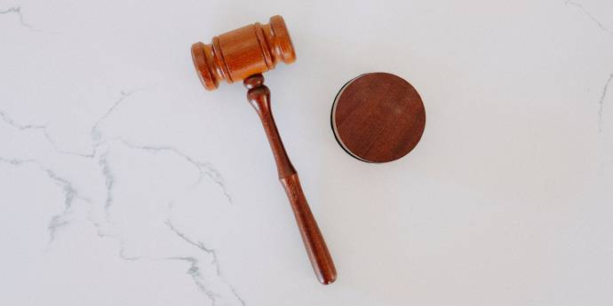 gavel on a marble table