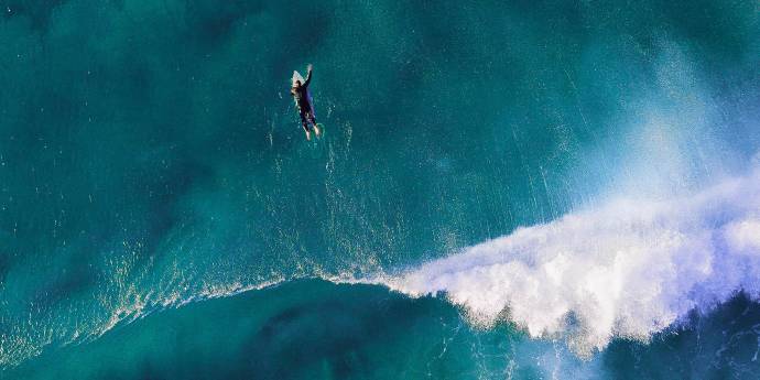 Aerial view of surfer in waves 