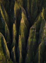 Moss covered peaked rocks