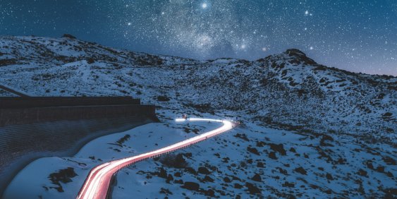 time lapse of car lights at night