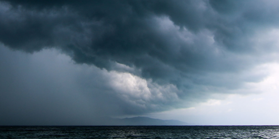 Dark clouds over ocean