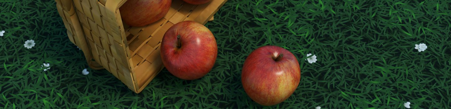 A tipped woven basket spills red and yellow apples onto lush green grass, creating a fresh, rustic harvest scene in soft natural light.
