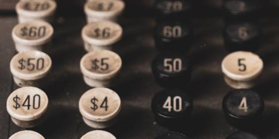 Old buttons on a cash register