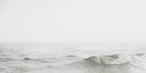 grey coloured waves breaking