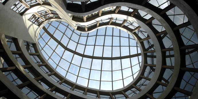 Low angle of an abstract glass building