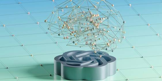 A mass of metal lines and spheres hovering over a flower shaped metal object, with a blue gradient background. 