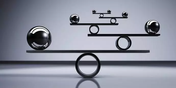 grey background with steel balance balls