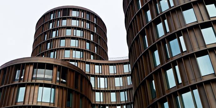 brown cylinder shaped buildings