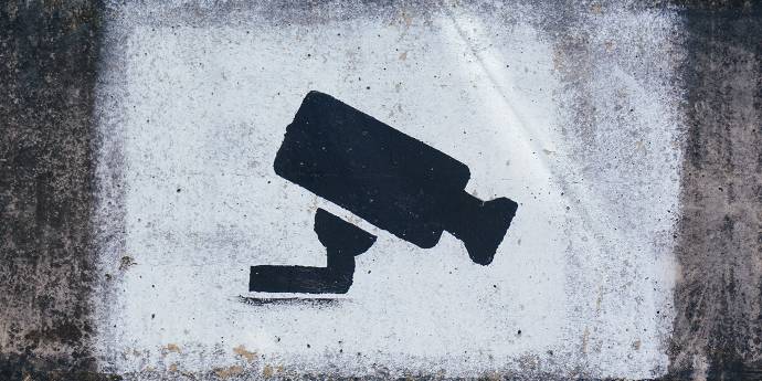 Security camera painted on concrete