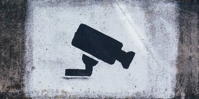 camera painted on concrete wall