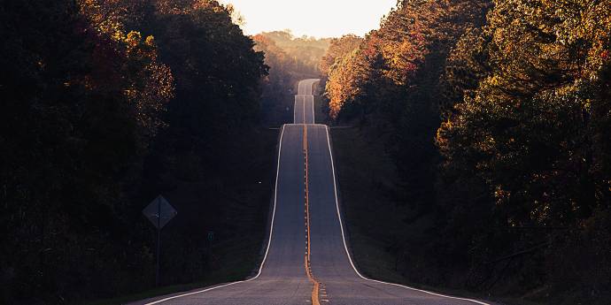 long straight road over small hills
