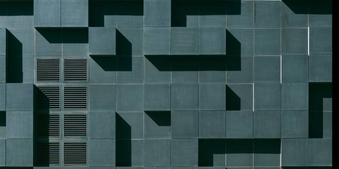 Concrete architectural geometric maze pattern 