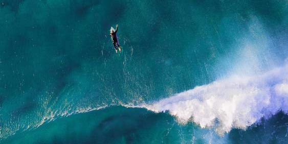 Aerial photo of surfer in waves