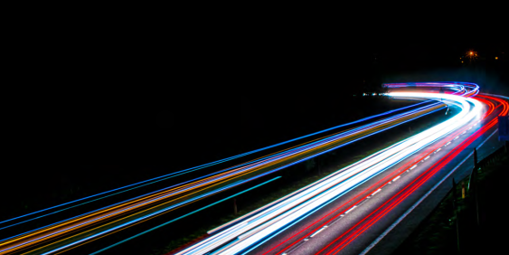 blurred car lights on road