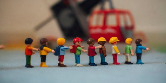 lego characters of different colours in a line