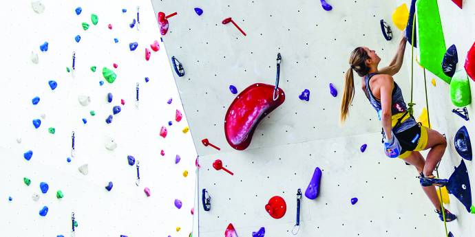 rock climber on climbing wall