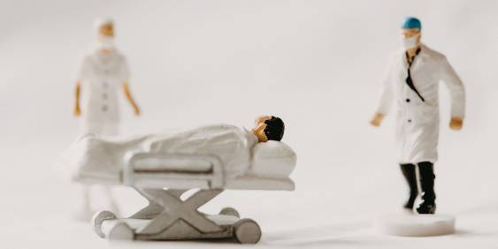 Doctors and patient figurines