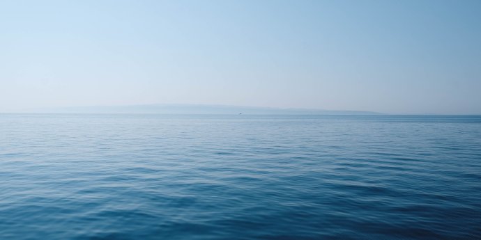 calm blue ocean and blue sky