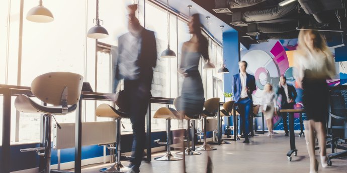 People walking through a building