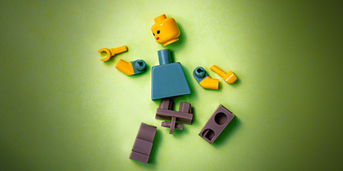 Lego man in pieces