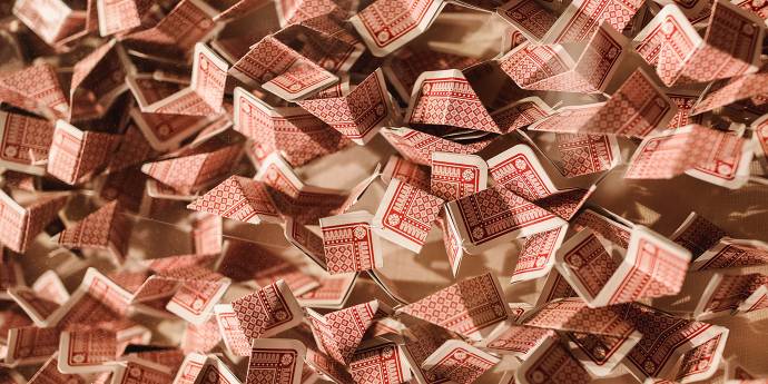 Scrunched up playing cards