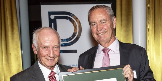 Alan Isaac presenting award to John Spencer