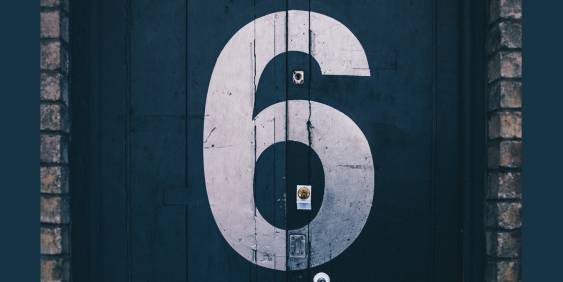 Number 6 painted on garage door