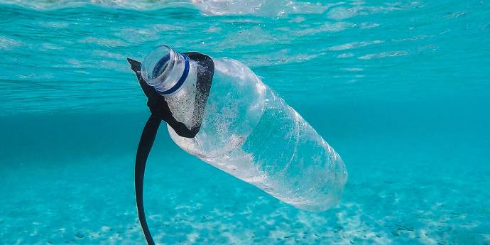 Plastic bottle floating in the ocean.