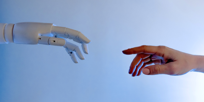  robot hand and human hand