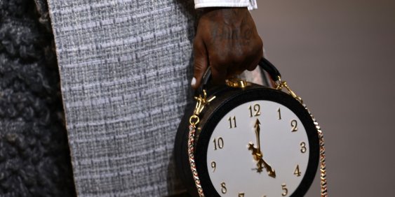 women holding handbag