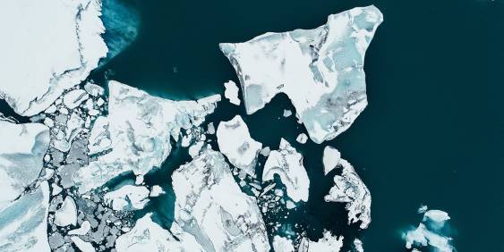 Icebergs breaking in a dark sea