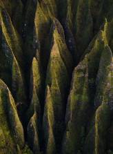 Moss covered peaked rocks